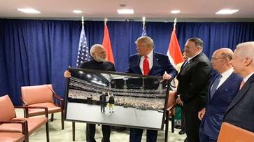 PM Modi presents Donald Trump a framed photograph from Howdy Modi event