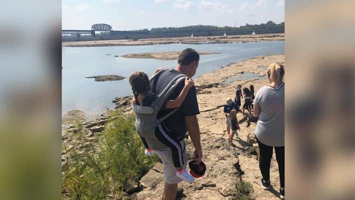 Viral pic of teacher carrying disabled kid on back at trip Viral pic of teacher carrying disabled kid on back at trip