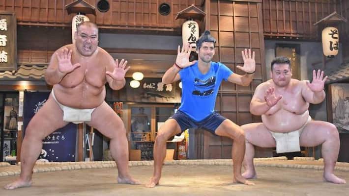 Novak Djokovc took on Sumo Wrestlers at Japan Novak Djokovc took on Sumo Wrestlers at Japan