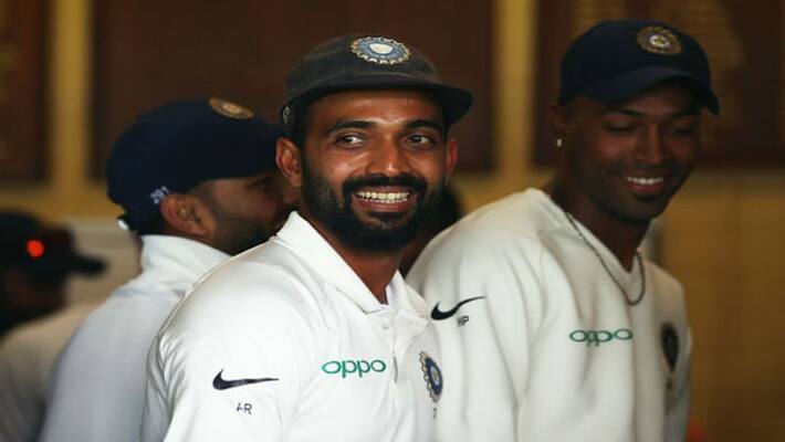 Rahane intorduces his new born baby with his wife Rahane intorduces his new born baby with his wife