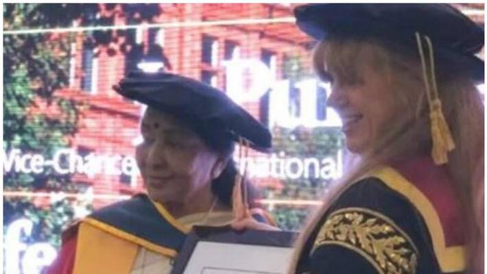 Asha Bhosle honoured with doctorate degree from University Of Salford in England Asha Bhosle honoured with doctorate degree from University Of Salford in England
