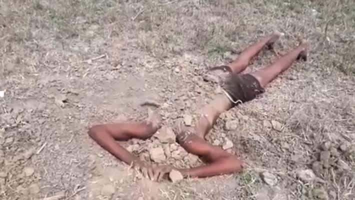 man buried her neck inside ground in meerut man buried her neck inside ground in meerut