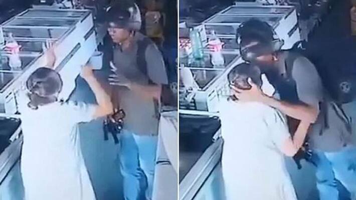 pharmacy robber takes mercy on elderly shopper and kisses pharmacy robber takes mercy on elderly shopper and kisses