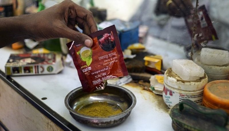 reason why bangladeshi men are dyeing their beards orange