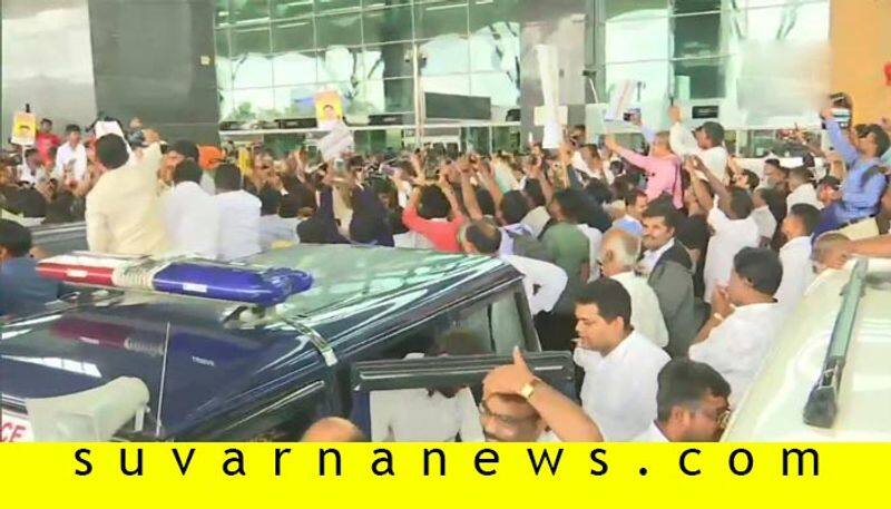 Congress leader DK Shivakumar welcomed by supporters at Bengaluru airport
