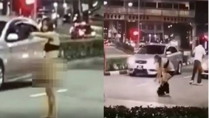 Woman Strips Naked In The Middle Of A Busy Road Singapore Woman Strips Naked In The Middle Of A Busy Road Singapore
