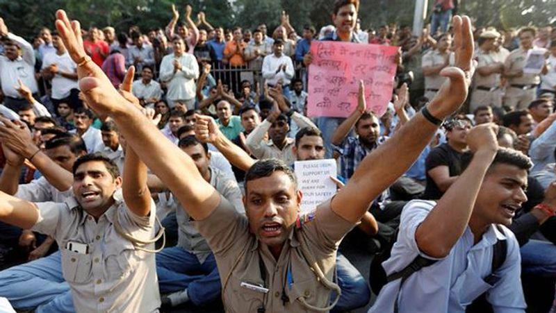 Policemen demonstrating in a dispute between police and lawyers in New Delhi