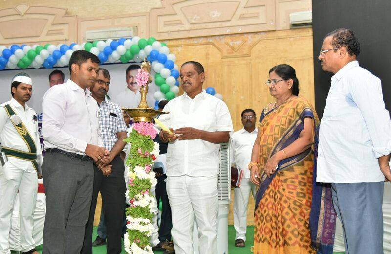 deputy cm  narayana swamy distributes cheques to agrigold victims at chittoor