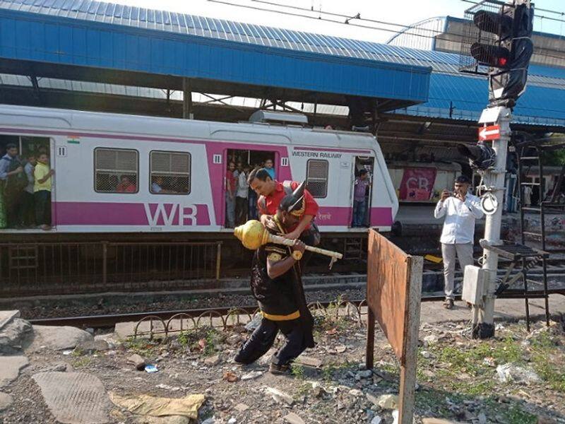 Fake Yamaraja lifts people on the mumbai Railway track