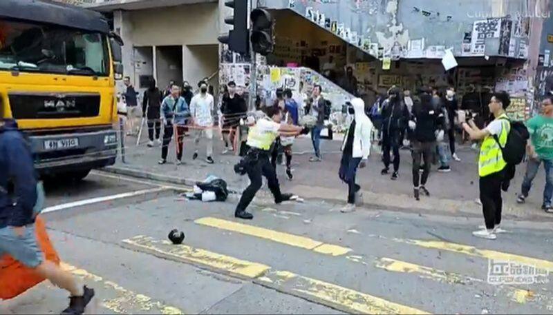 Hong Kong police shoot man in Monday morning