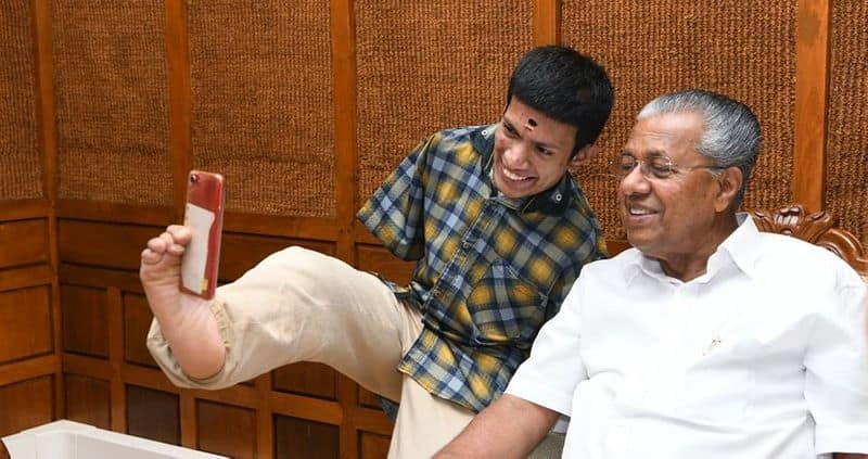 Differently Abled Kerala Artist Donates Flood Relief Fund To CM Pinarayi Vijayan