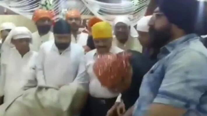 bureaucrat Touching Minister's Feet in madhyapradesh bureaucrat Touching Minister's Feet in madhyapradesh