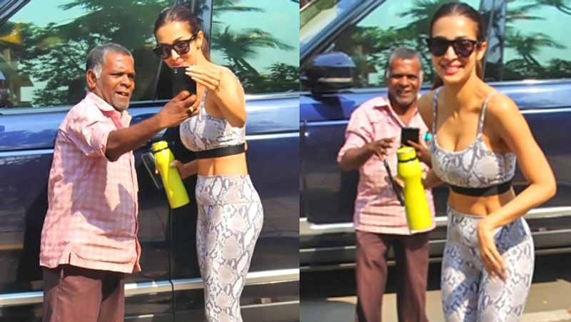 Malaika Arora Selfie with an Oldman in mumbai