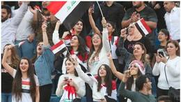 protesters in iraq celebrate football win against iran
