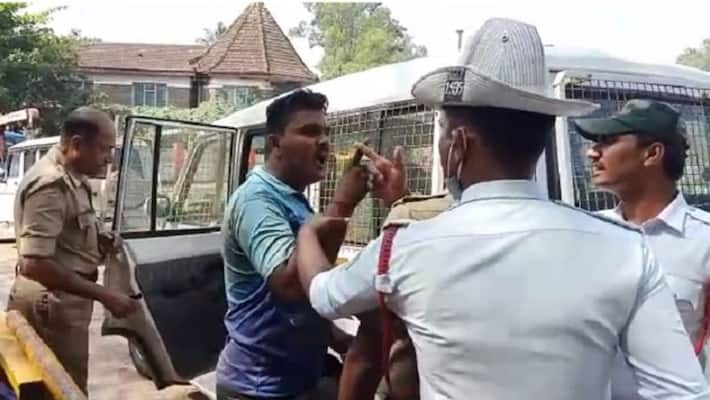Man slaps tarffic police in belagavi Man slaps tarffic police in belagavi