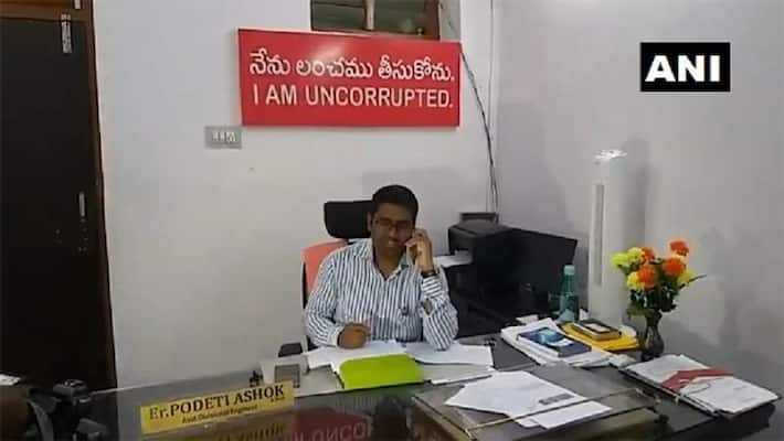 Here the staff was so scared, an officer put the board "I am not corrupt" Here the staff was so scared, an officer put the board "I am not corrupt"
