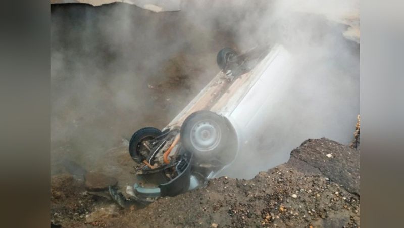 Two men boiled alive as hole swallows their car in Sinkhole in russia