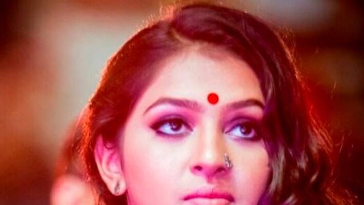actress lakshmi menon new tattoo photos goes viral in social media actress lakshmi menon new tattoo photos goes viral in social media