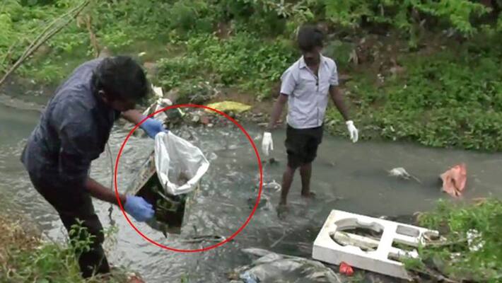 newly born baby's deadbody rescued from drain water newly born baby's deadbody rescued from drain water