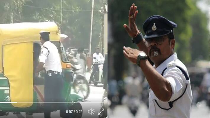 Famous policemen for controlling traffic while dancing beat up Auto driver, watch video Famous policemen for controlling traffic while dancing beat up Auto driver, watch video