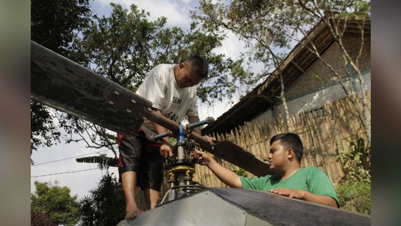 Man irritated by traffic jam made helicopter at backyard of house