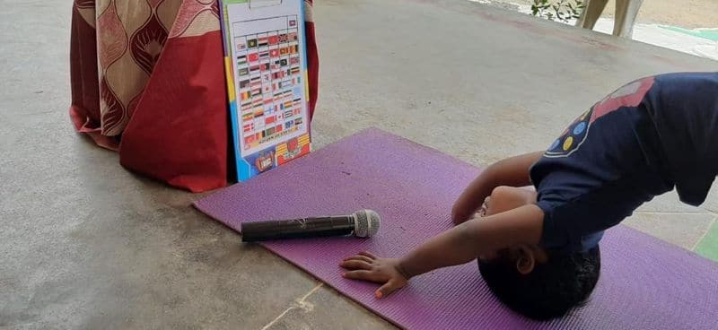 4 year old girl says thirukural while doing yoga