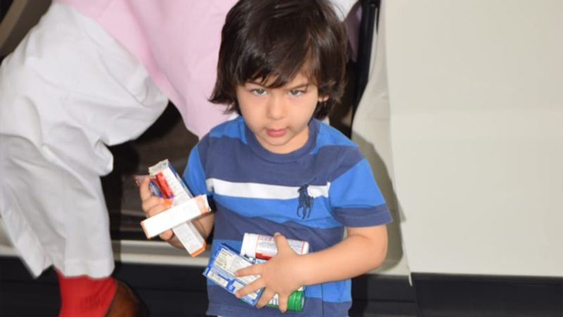 saif ali khan with son taimur ali khan spotted at airport