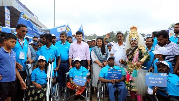 MP Tejasvi Surya flags off DXC Bengaluru Walkathon; thousands participate to fight against water problems MP Tejasvi Surya flags off DXC Bengaluru Walkathon; thousands participate to fight against water problems