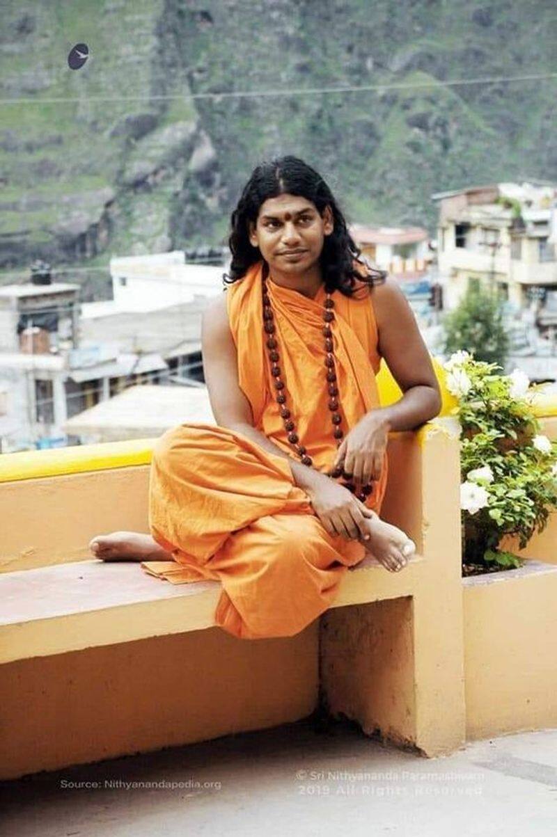 you beat me up and made a god man out of me, confesses Nithyananda in an emotional speech