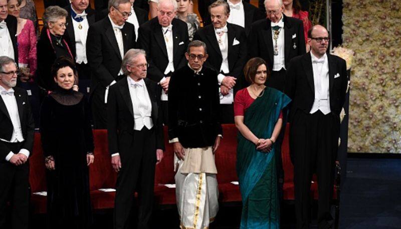 Dressed in dhoti and sari, Abhijit Banerjee and Esther Duflo receive Economics Nobel