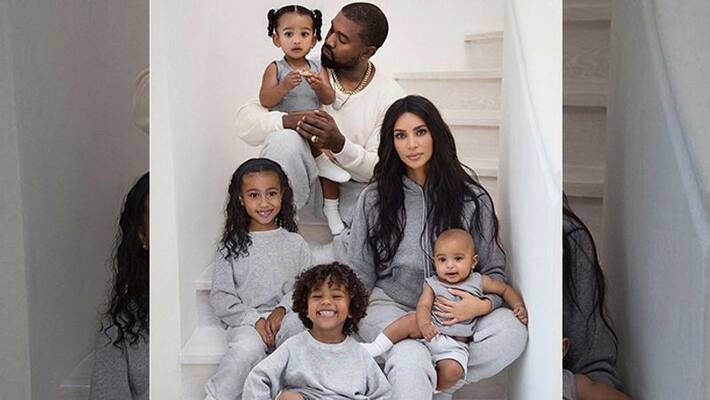 Kim Kardashian poses with husband Kanye West along with children for Christmas card Kim Kardashian poses with husband Kanye West along with children for Christmas card