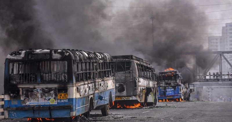 anti CAB protest burns violence Protesters vandalise railway stations block roads in west Bengal kpt