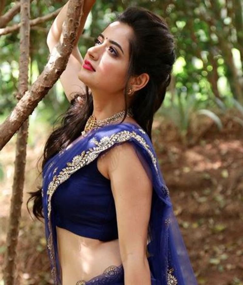 Ashika ranganath seen driving car without mask vcs