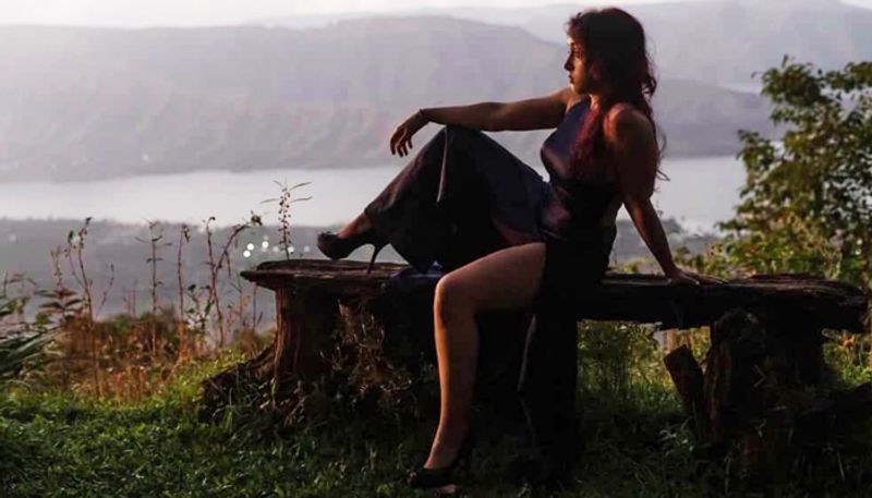 The 21-year-old Ira is seen posing on a wooden plank stand while flaunting her perfect body wearing a thigh-high gown.