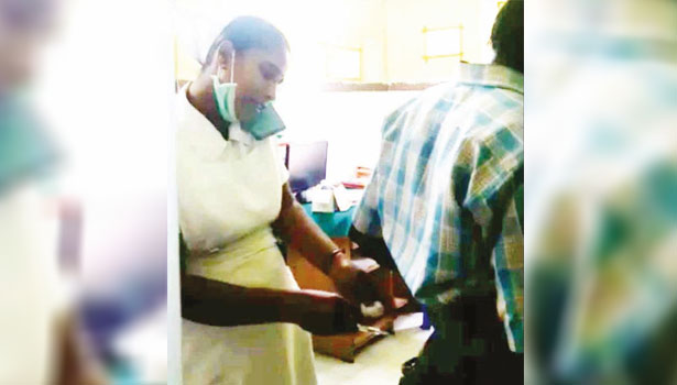 nurse put injection to a patient by speaking in cell phone nurse put injection to a patient by speaking in cell phone