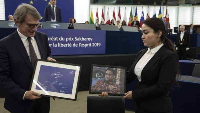 Daughter of noted Uighur economist receives European humanitarian prize on his behalf
