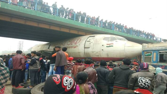 Cargo Plane stuck under the bridge at durgapur Cargo Plane stuck under the bridge at durgapur