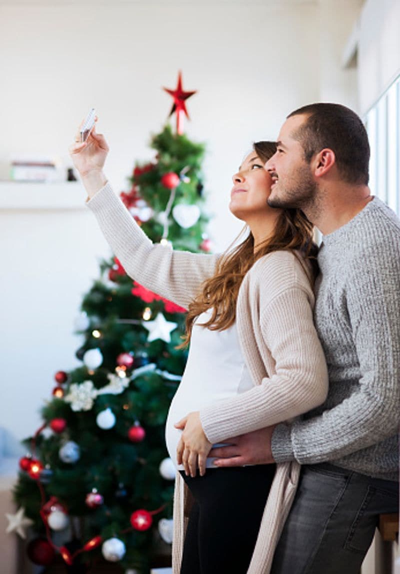She waits for Christmas and the baby