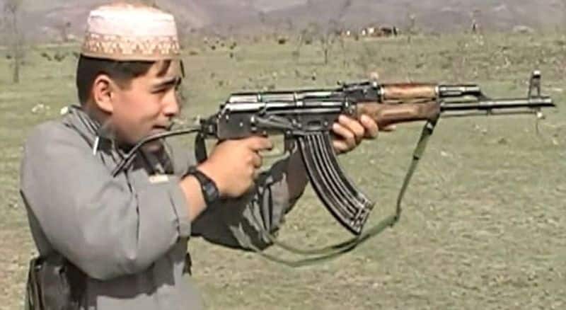 Afghan village where children come to school with AK 47 Assault rifles