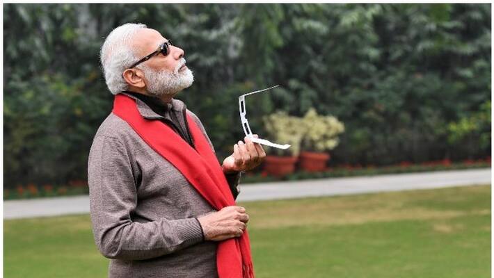 pm modi could not see solar eclipse due to dense fog in delhi pm modi could not see solar eclipse due to dense fog in delhi