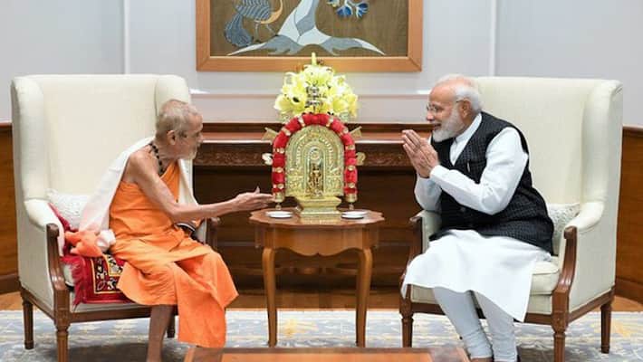 PM Narendra Modi Amit Shah Expressed Condolences On Pejawara Shri Death PM Narendra Modi Amit Shah Expressed Condolences On Pejawara Shri Death