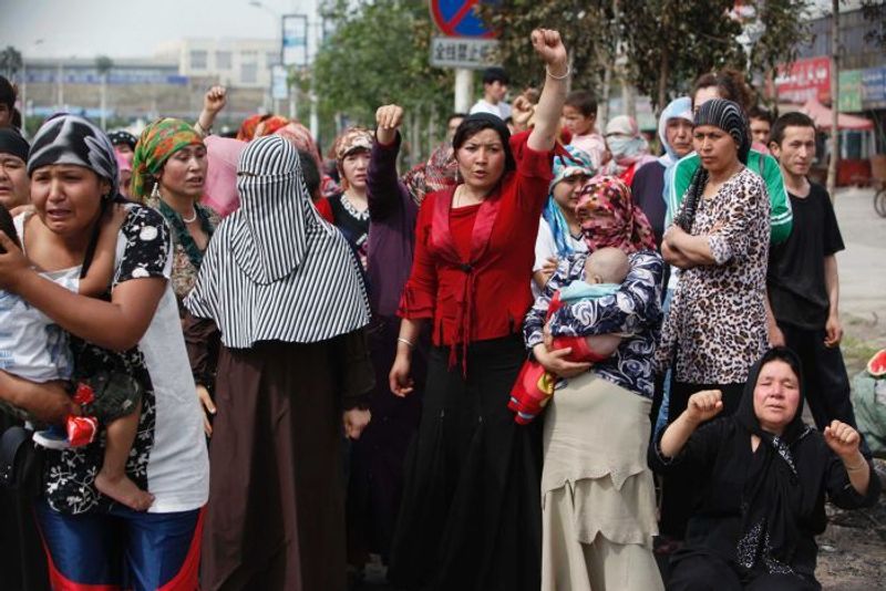 activists told uighur muslim women mass pysical harassted by chinese men to promote ethnic unity program kpt