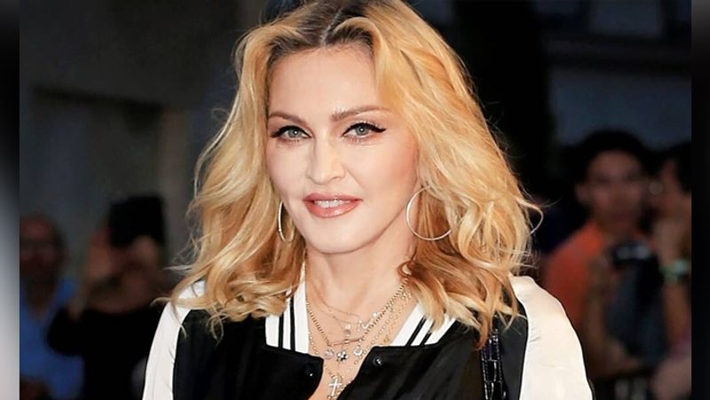american singer madonna fell down in love in Age of 61 she is dating 25 years old dancer KPY