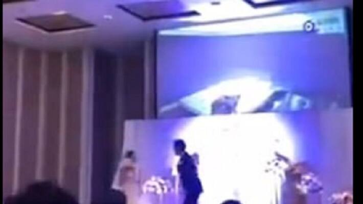 Groom takes revenge on his cheating bride by playing a video of her naked in bed China Groom takes revenge on his cheating bride by playing a video of her naked in bed China