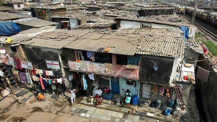 BJP installed PM Modi hoardings in slum colonies To redeem PMAY kpm BJP installed PM Modi hoardings in slum colonies To redeem PMAY kpm