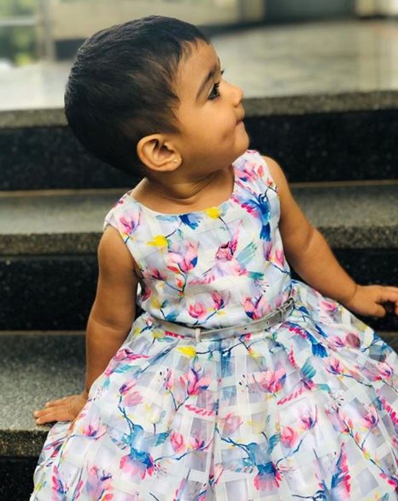 Kannada actress Anu Prabhakar and Raghu Mukherjee daughter nandana photo gallery
