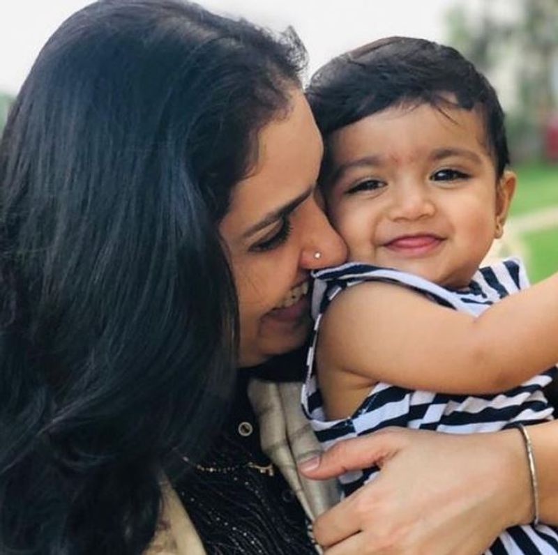 Kannada actress Anu Prabhakar and Raghu Mukherjee daughter nandana photo gallery