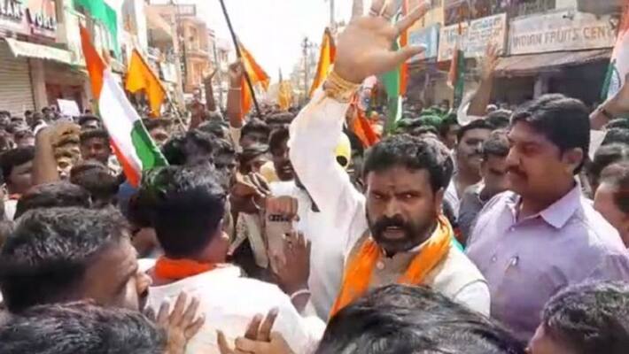 MP S Muniswamy slaps bjp worker in kolar MP S Muniswamy slaps bjp worker in kolar