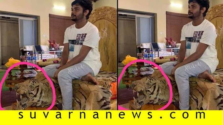 Vinay Guruji might face to legal trial as his photo viral with tiger pelt Vinay Guruji might face to legal trial as his photo viral with tiger pelt