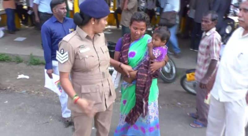 district collector questioned a woman who begged with a child